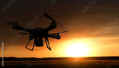 Fotografia 3d render quadrocopters silhouette in the background. radio-cont