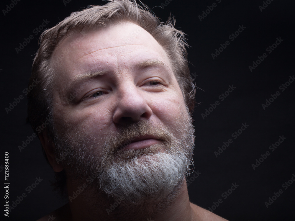 Portrait of a bearded man. Grimace Portrait of a bearded man. Grimace