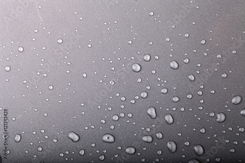 Drops of water on a color background. Gray. Toned