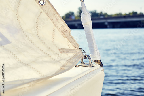 Fototapeta Staysail's carbine hooks on yacht before VIRA sails