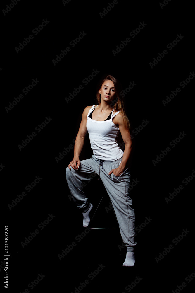 Muscular body of a young woman, abs close up. Woman's abs Muscular body of a young woman, abs close up. Woman's abs