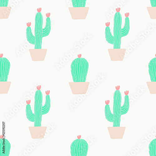 Seamless pattern with cactus and flowers in green and pink on cream background. © xuliadore