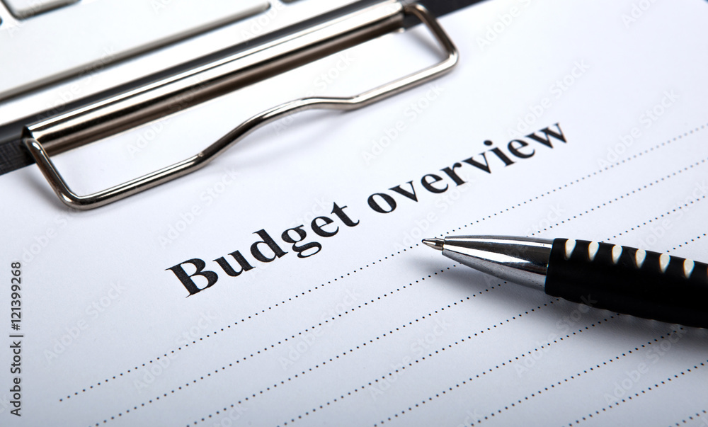 document with title budget overview and pen document with title budget overview and pen