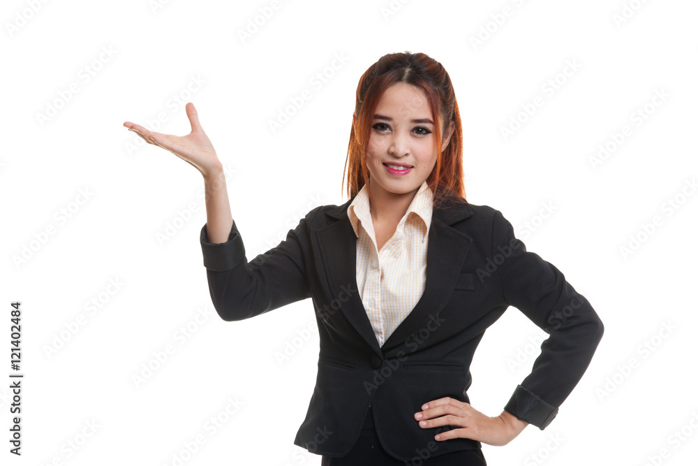 Young Asian business woman present with her hand. Young Asian business woman present with her hand.