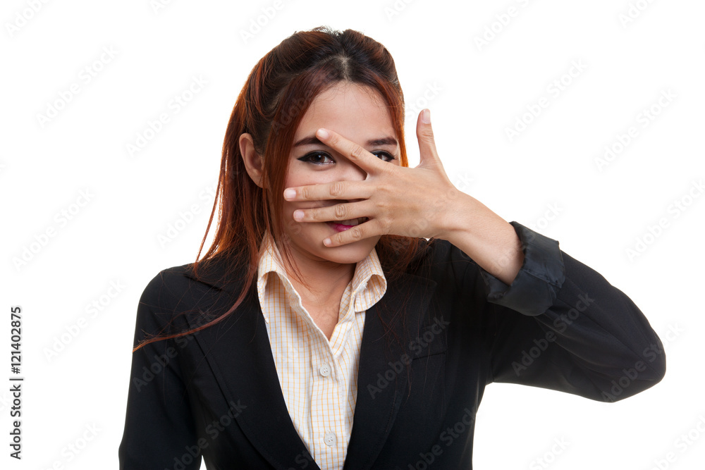Beautiful young Asian woman peeking through fingers. Beautiful young Asian woman peeking through fingers.