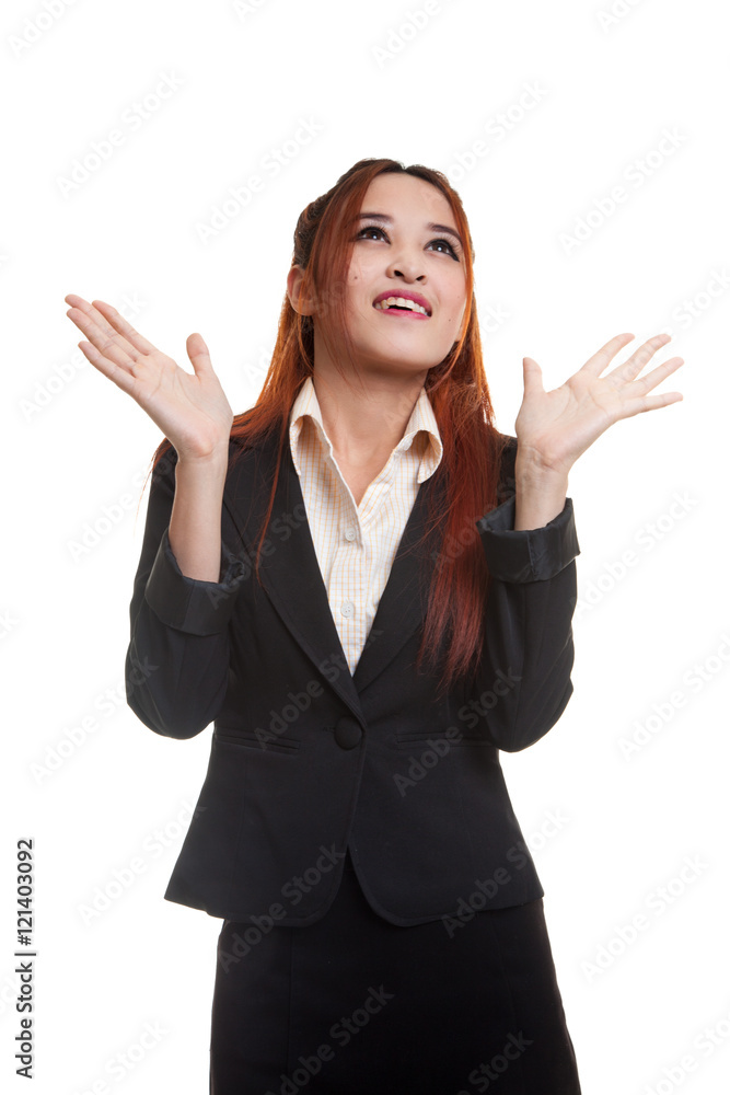 Excited young Asian business woman look up. Excited young Asian business woman look up.