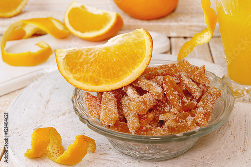 Homemade candied orange peels in glass bowl