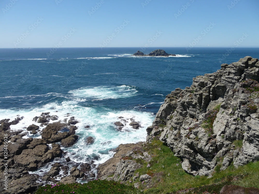 View of rugged coastline at Cape Cornwall,England on a sunny day in late Springtime