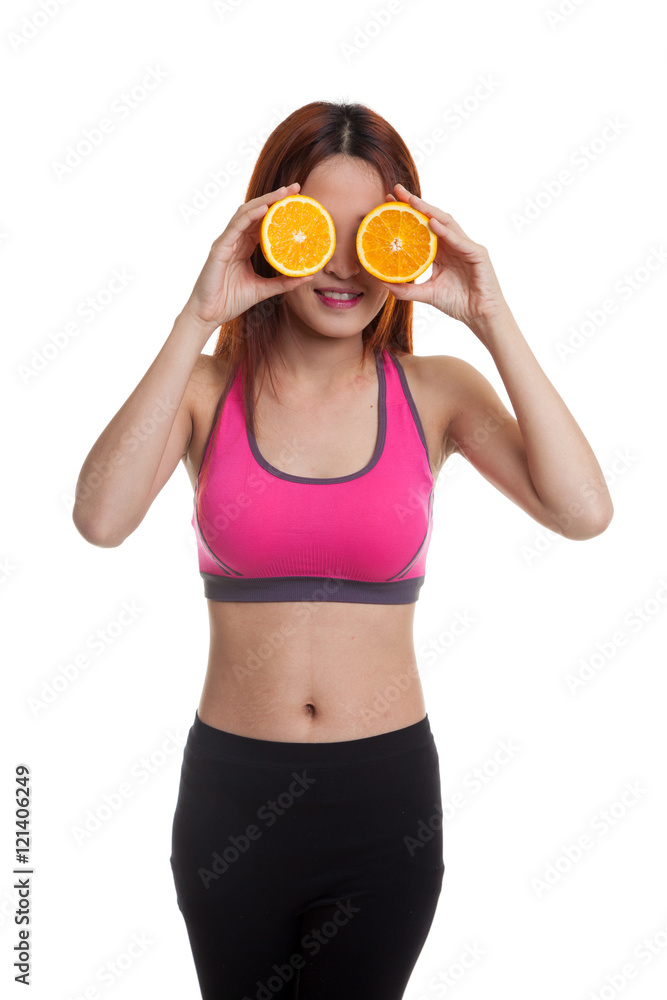 Beautiful Asian healthy girl with orange fruit over her eyes. Beautiful Asian healthy girl with orange fruit over her eyes.