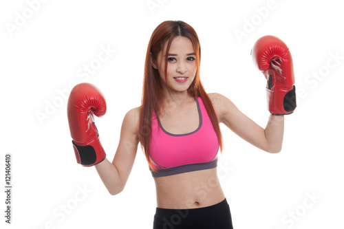 Beautiful healthy Asian girl with red boxing glove.