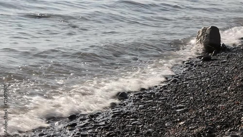 black sea coast. Waves breaking on the shore.