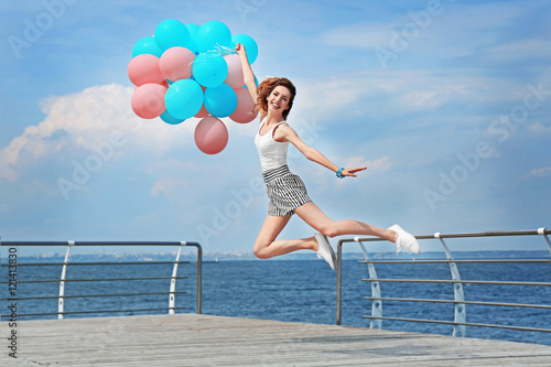 Beautiful young woman with ...
