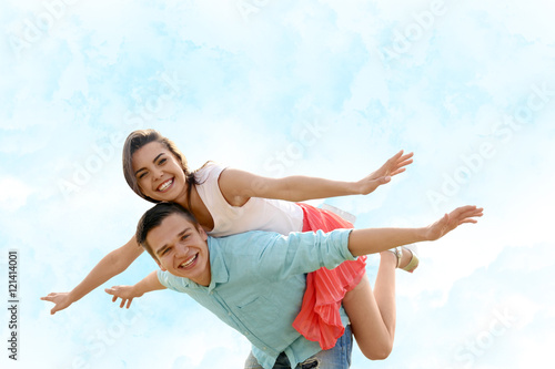 Young couple having fun on a field