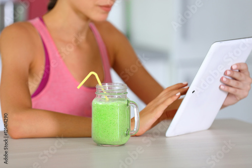 Girl with tablet and smooth...