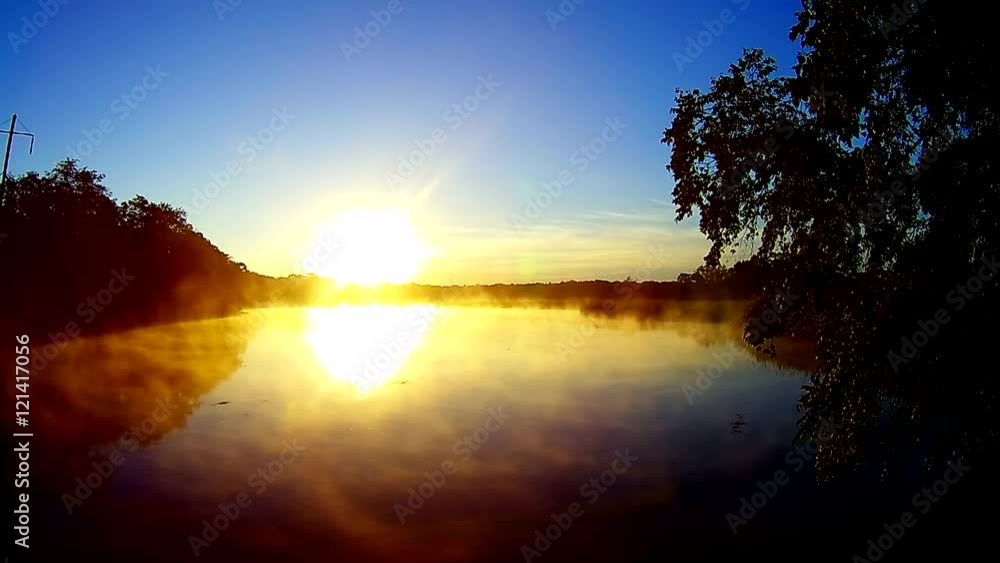 fog and steam over the forest and lake reflection of trees in water
fog and steam over the forest and lake reflection of trees in water