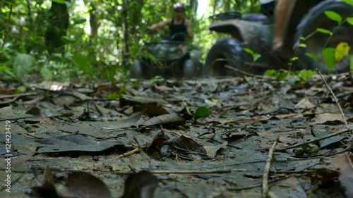 action of ATV in the rain forest of Thailand 
