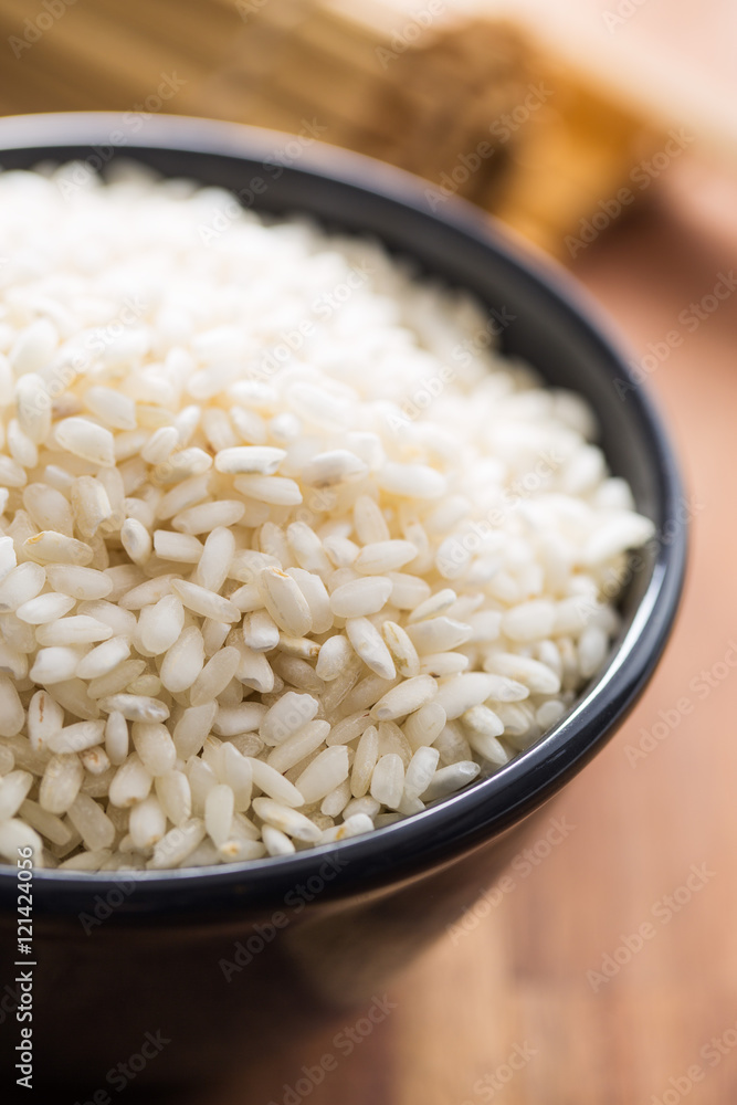 Arborio rice in bowl. Arborio rice in bowl.