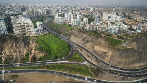 Aerial view of Armendaris downhill, Miraflores town and the Costa Verde reef in Lima, Peru. photo