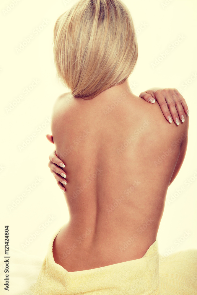 Alternative medicine and body treatment concept. Atractive young woman after shower with towel Alternative medicine and body treatment concept. Atractive young woman after shower with towel