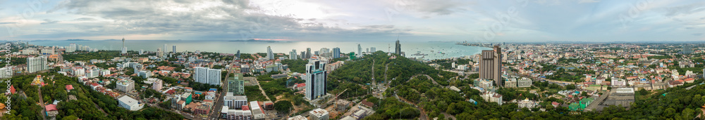 Aerial 360 degree panoramic scene of Pattaya bay and City at the sunset