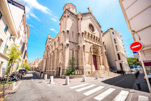 Street view with Notre-Dame de Bon Voyage church in Cannes in France