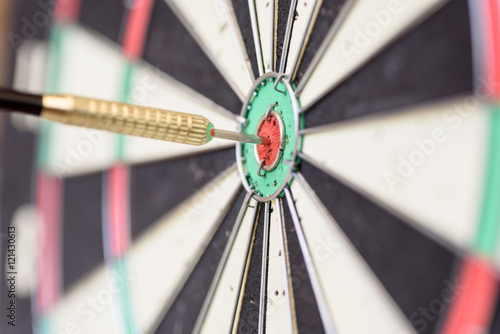 Single Dart Stuck in a Bullseye Board