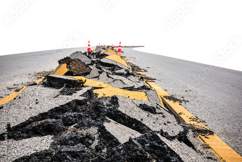 cracked asphalt road with marking lines and  orange-white stripe safty cones on white background, selective focus,