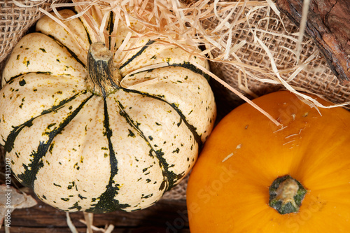 Wallpaper Mural Top view of table with pumpkin and straw Torontodigital.ca