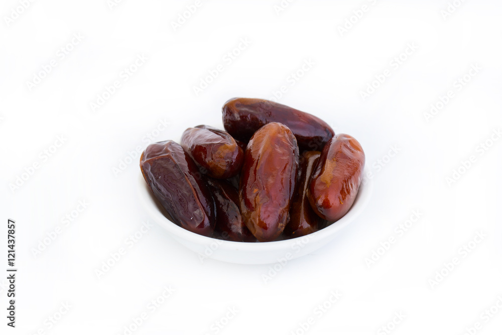 Sweet and healthy dates isolated on white background. Sweet and healthy dates isolated on white background.