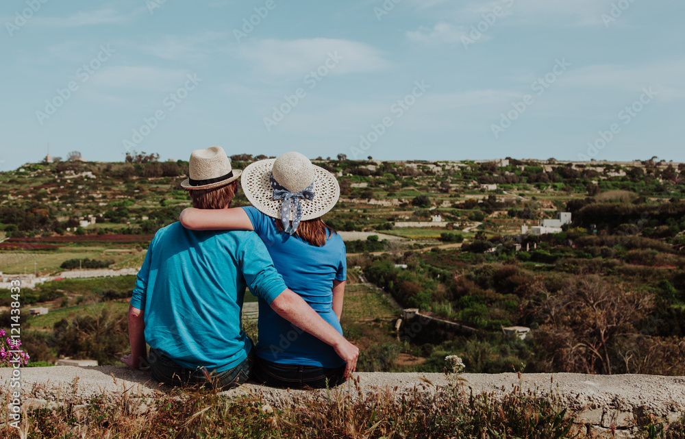 happy loving young couple on vacation in the country