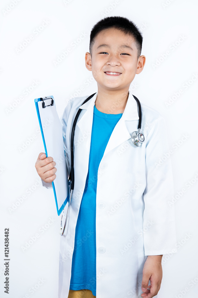 Asian Chinese boy pretending as doctor with clipboard Asian Chinese boy pretending as doctor with clipboard