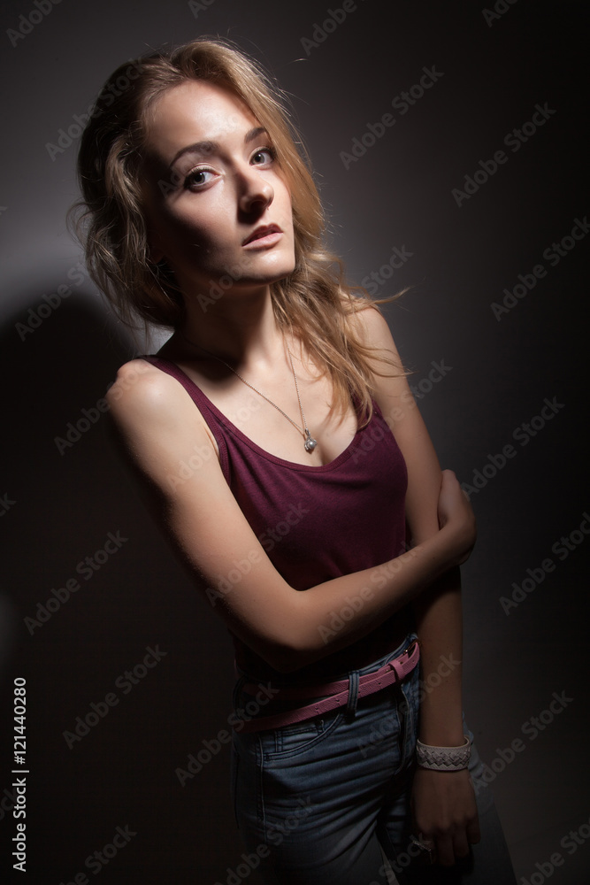 Beautiful blonde on a black background. Beautiful blonde on a black background.