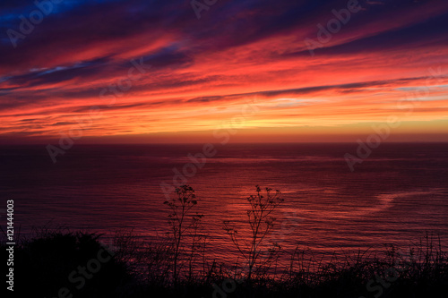 Dramatic colorful sunset on the Pacific Ocean