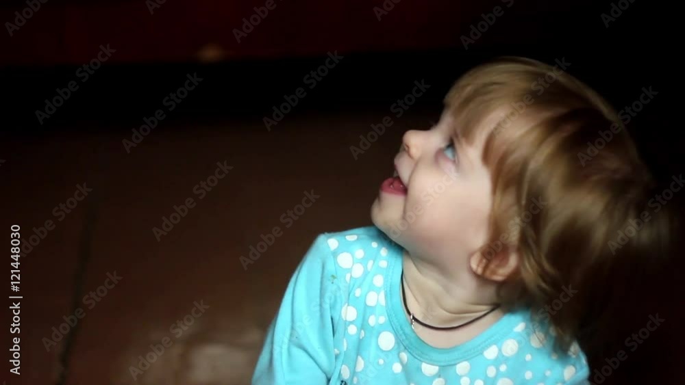 the child looks at the camera the child looks at the camera