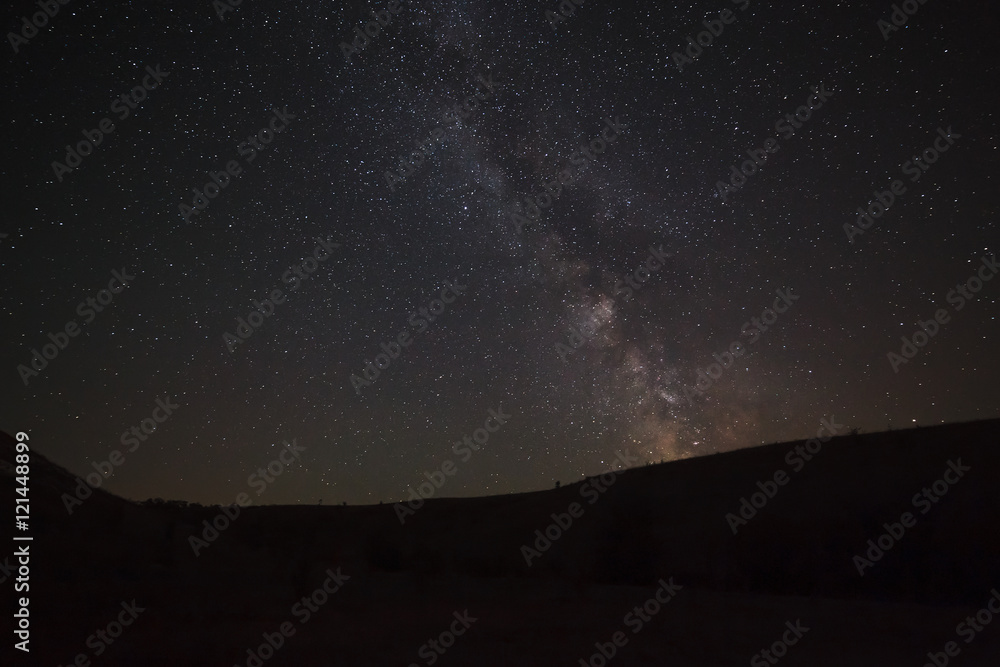 Night sky with bright stars. View of the Milky Way.