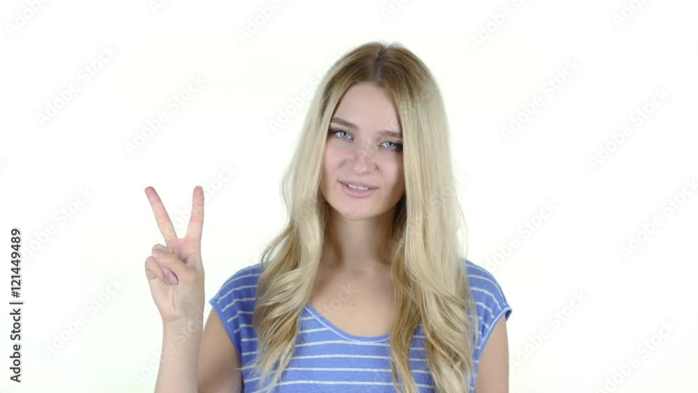 Portrait OF Beautiful Woman Showing Victory Sign, White Background Portrait OF Beautiful Woman Showing Victory Sign, White Background