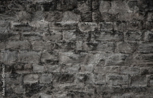 old dark cement wall in the gray color