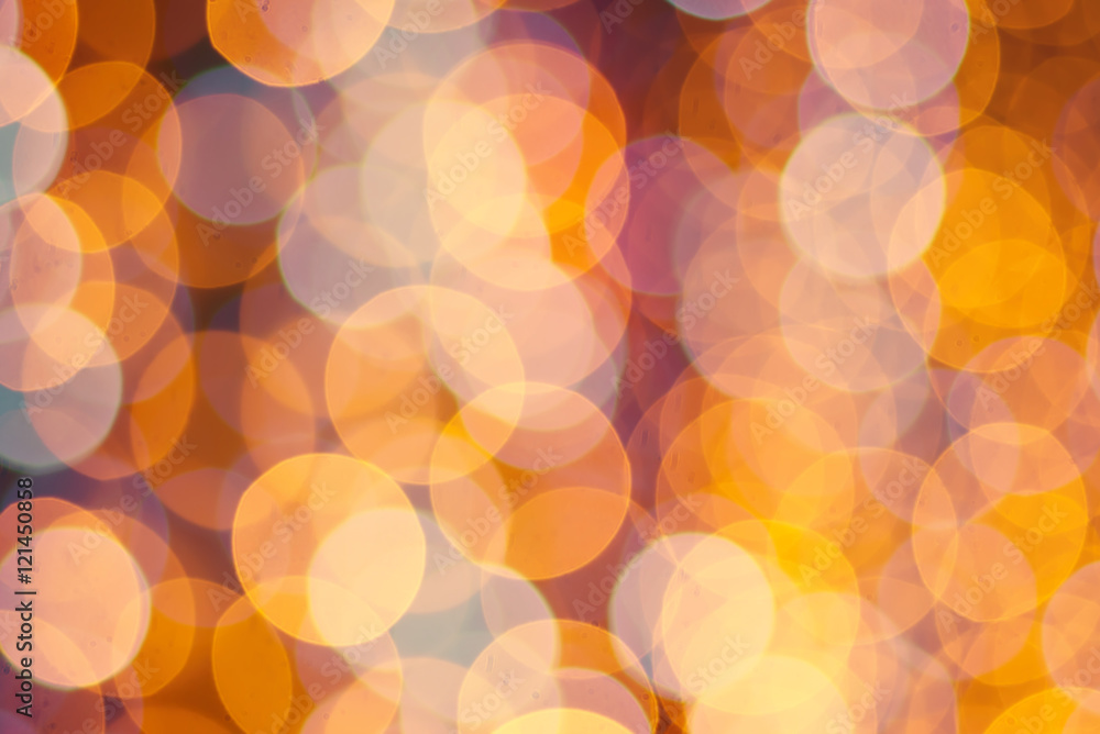 Christmas shiny bokeh in yellow golden colors, new year illunination. Seasonal holiday background. Christmas shiny bokeh in yellow golden colors, new year illunination. Seasonal holiday background.