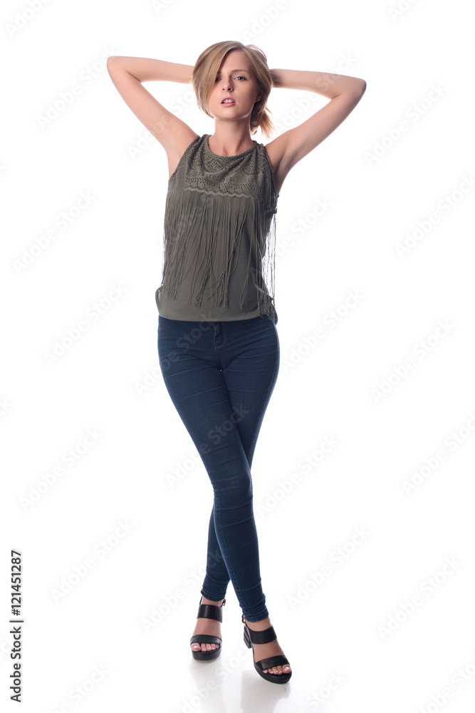 Young pretty long haired blonde woman posing in casual clothes on white background in a studio. Spring summer photo, catalog collection. Young pretty long haired blonde woman posing in casual clothes on white background in a studio. Spring summer photo, catalog collection.