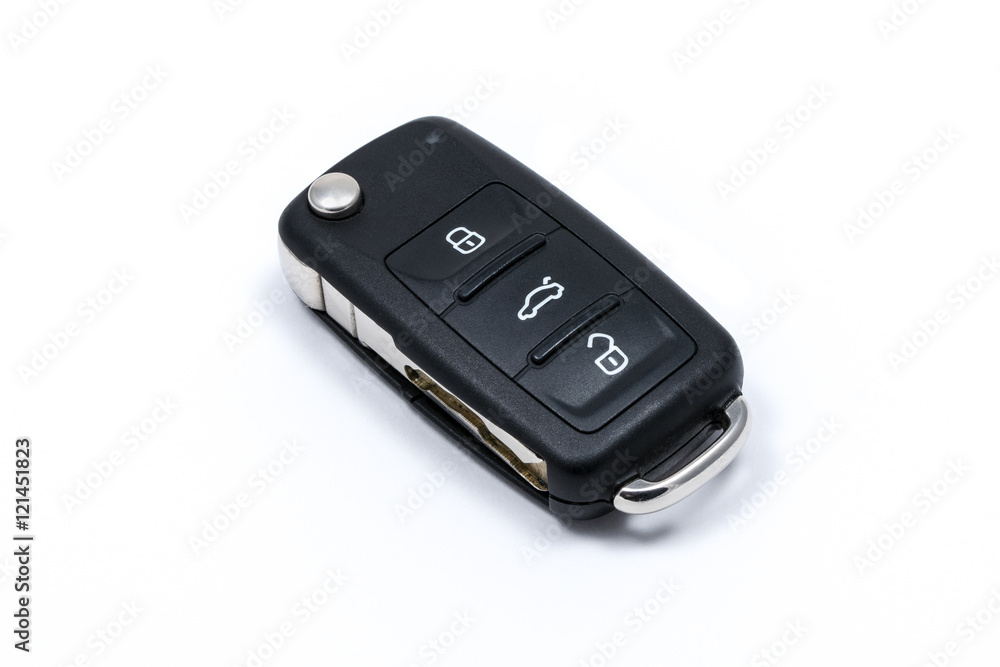 Modern folding car key isolated on white background Modern folding car key isolated on white background