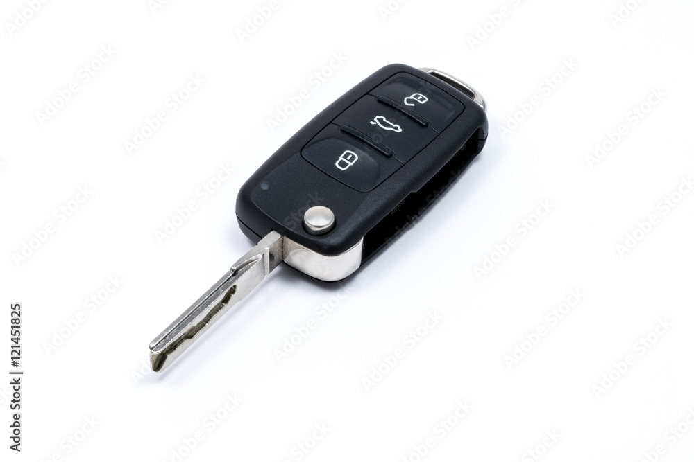 Modern folding car key isolated on white background Modern folding car key isolated on white background