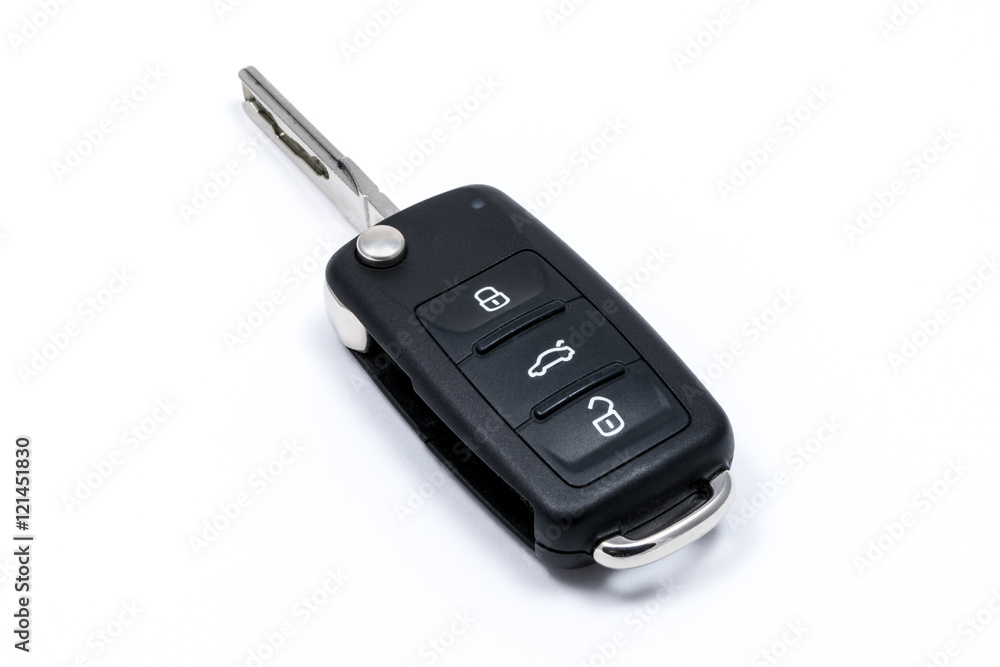 Modern folding car key isolated on white background Modern folding car key isolated on white background