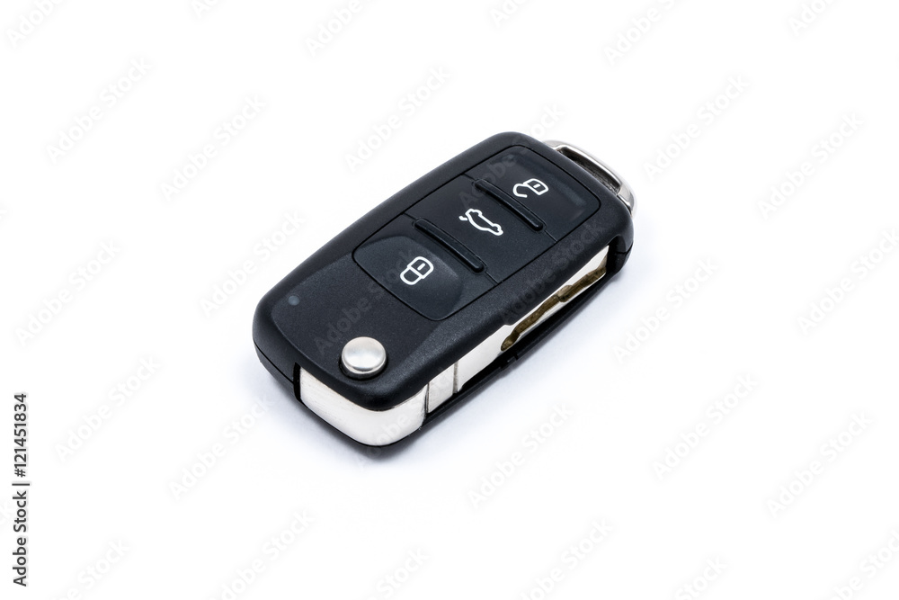 Modern folding car key isolated on white background Modern folding car key isolated on white background