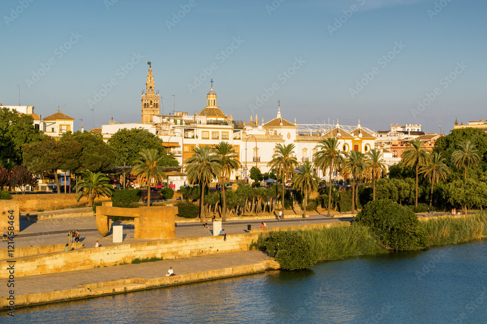 Sunset view of Sevilla from the brige over Guadalquivir, Andalusia province, Spain.