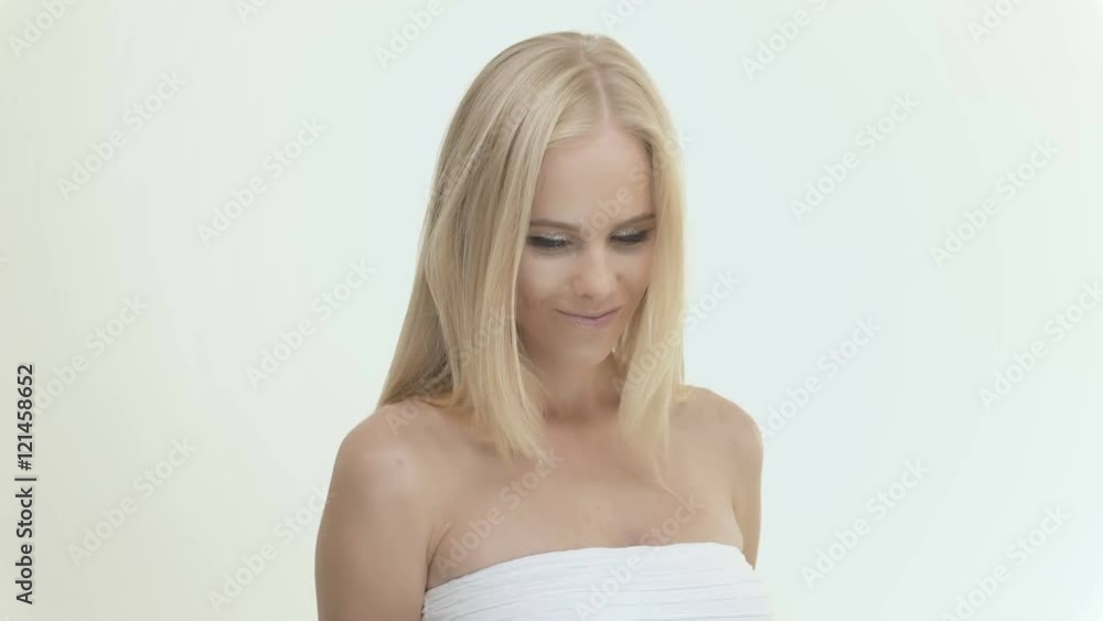 Beautiful young sweet shy pretty girl in white top and bright make up Beautiful young sweet shy pretty girl in white top and bright make up