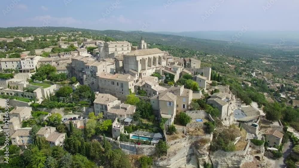 Aerial view of Gordes, labelled Most Beautiful Villages of France, perched on a rocky outcrop at the end of the Vaucluse plateau, 4K, UHD (3840X2160) Aerial view of Gordes, labelled Most Beautiful Villages of France, perched on a rocky outcrop at the end of the Vaucluse plateau, 4K, UHD (3840X2160)