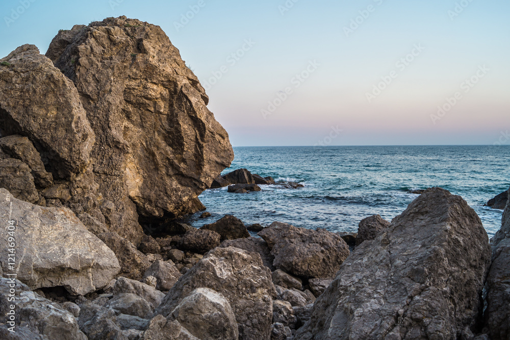 Sea and rocks at sunset