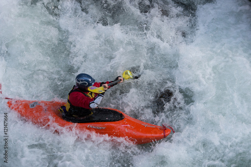 Red Kayak in white rapids © Daniel