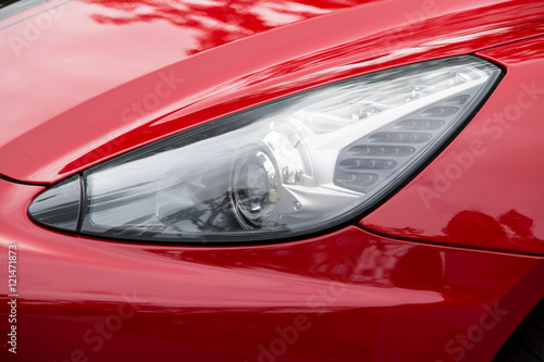 Detail of car light. Luxury, elegant automobile. Design of car lamp. Close up.
