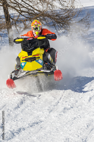 Snowmobile in action